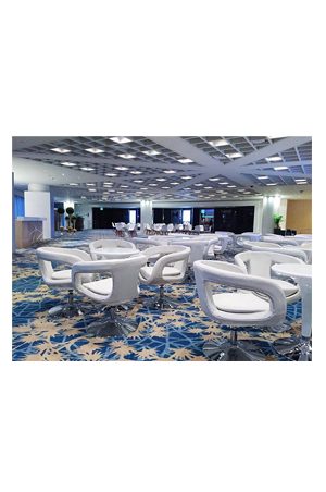 a large conference room with scoop swivel chairs and tables