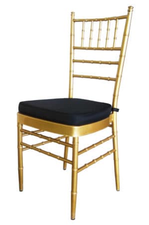 a gold tiffany chair with black cushion