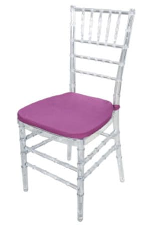 a clear tiffany chair transparent with purple cushion