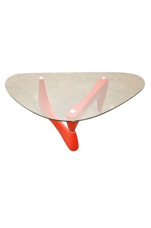 a replica isamu noguchi coffee table with red legs and a glass top