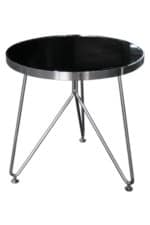 a triped side table with a black glass top and metal legs