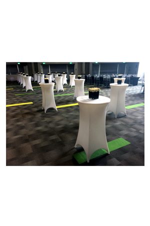 a large room with illuminated baron bistro tables and chairs on the floor