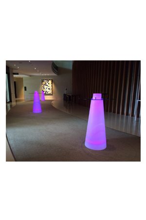 a group of illuminated pinnacle bistro tables in a lobby