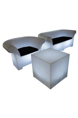 an illuminated cube 60 living room set with a white couch and a coffee table