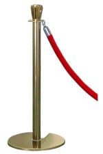 A Classic Gold Pole With Red Rope stand.